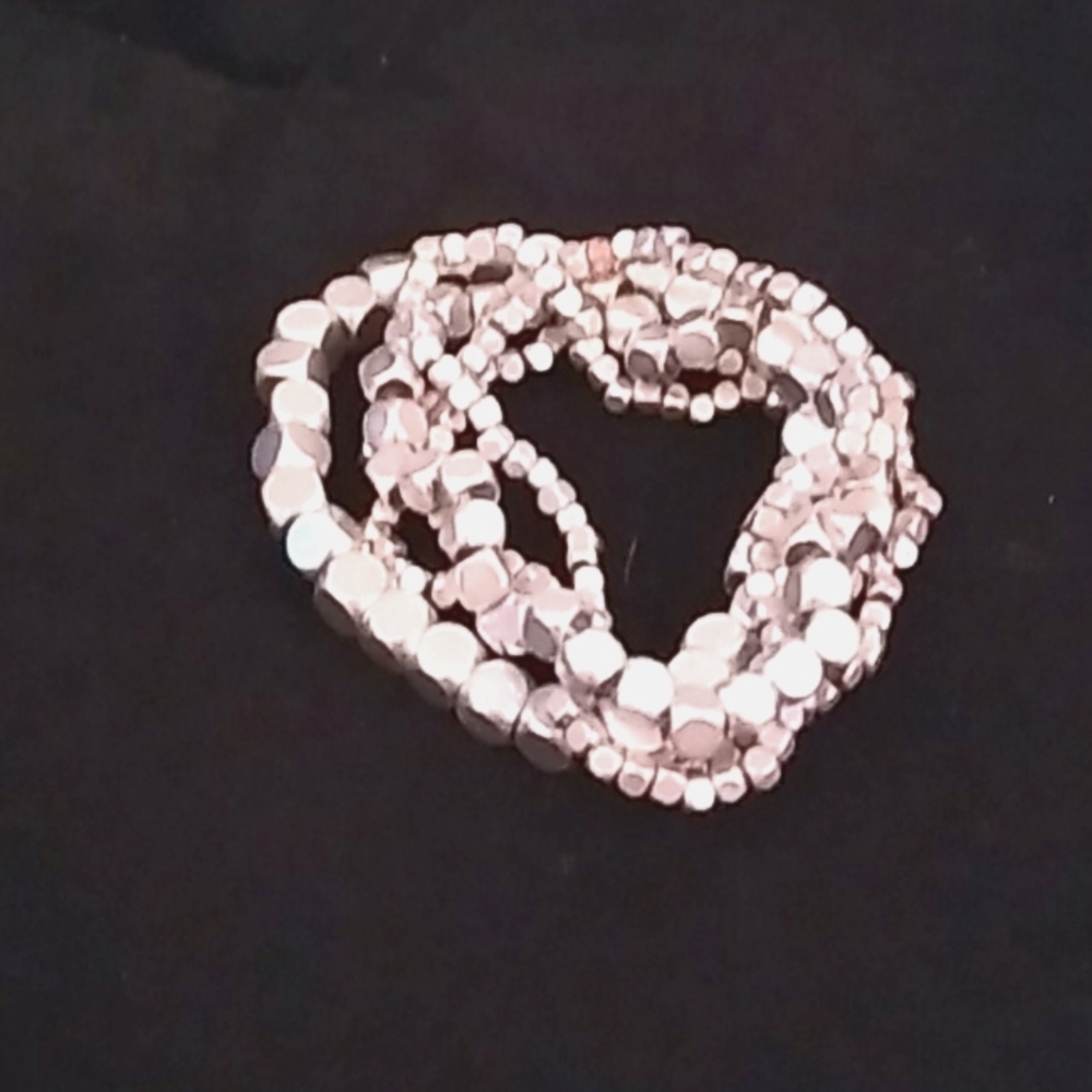 Silver beaded stretchy set of bracelets
